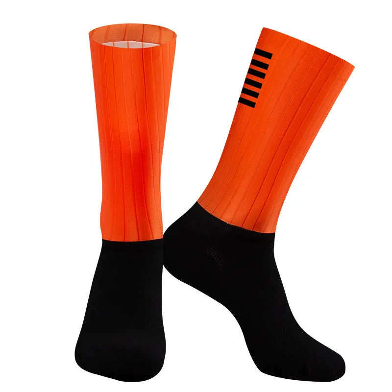 Pair of athletic socks for cycling and running in a chemical fibre blend, shown in one of six available colours.