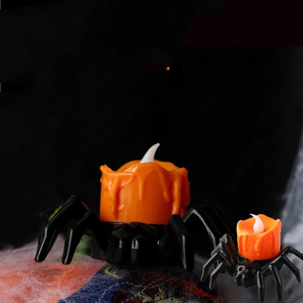Halloween spider candlestick ornament with plastic construction and battery-powered lighting