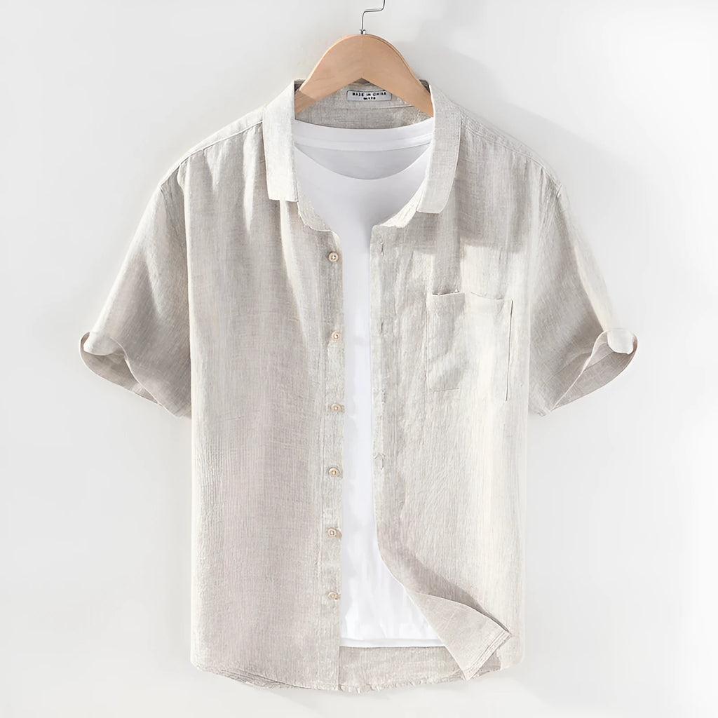 Men's short sleeve linen shirt with a square collar in raw jute colour on a hanger.