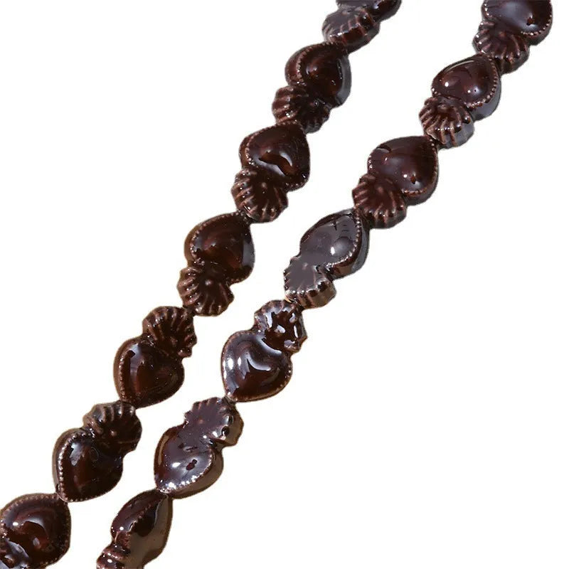 Ceramic love heart small torch shaped beads in various colours with straight holes for jewellery making
