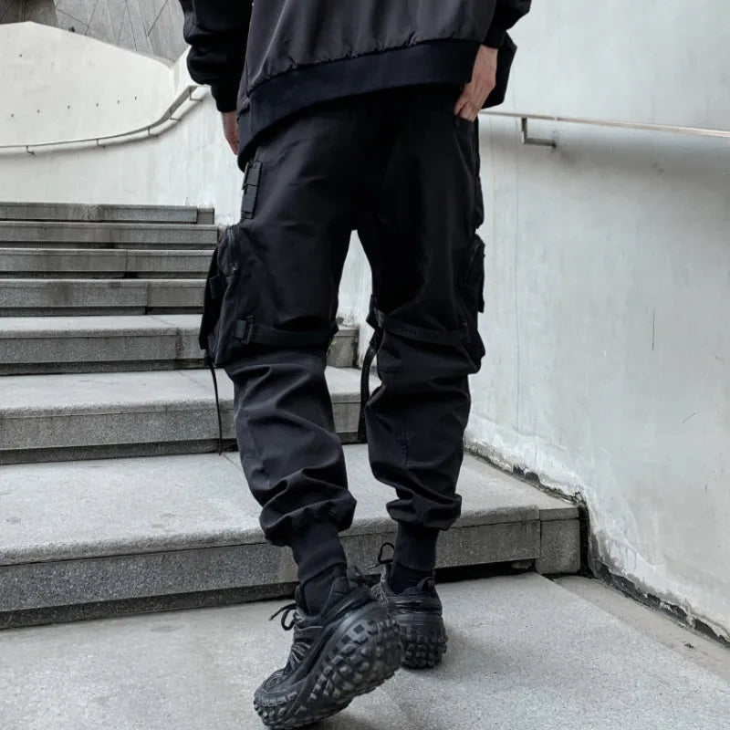 Men's black loose fit casual overalls with elasticated waist and binding hem, front view