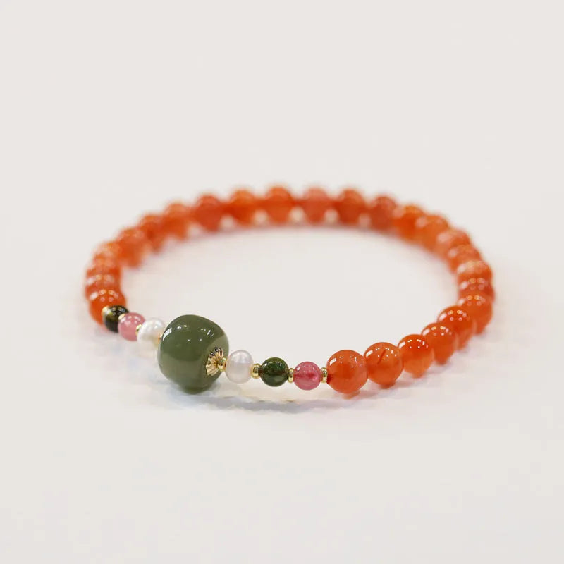 A round bead bracelet made from natural cherry red South Red Agate with a retro ethnic style.