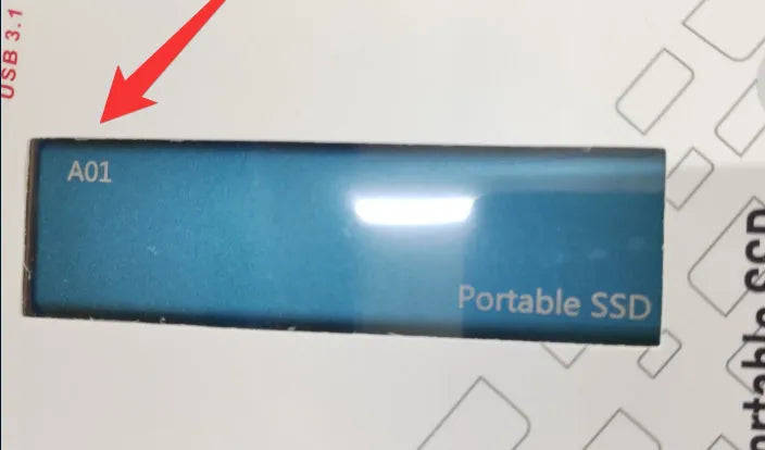 External mobile SSD hard drive with ultra-thin metal casing showing red interface connector