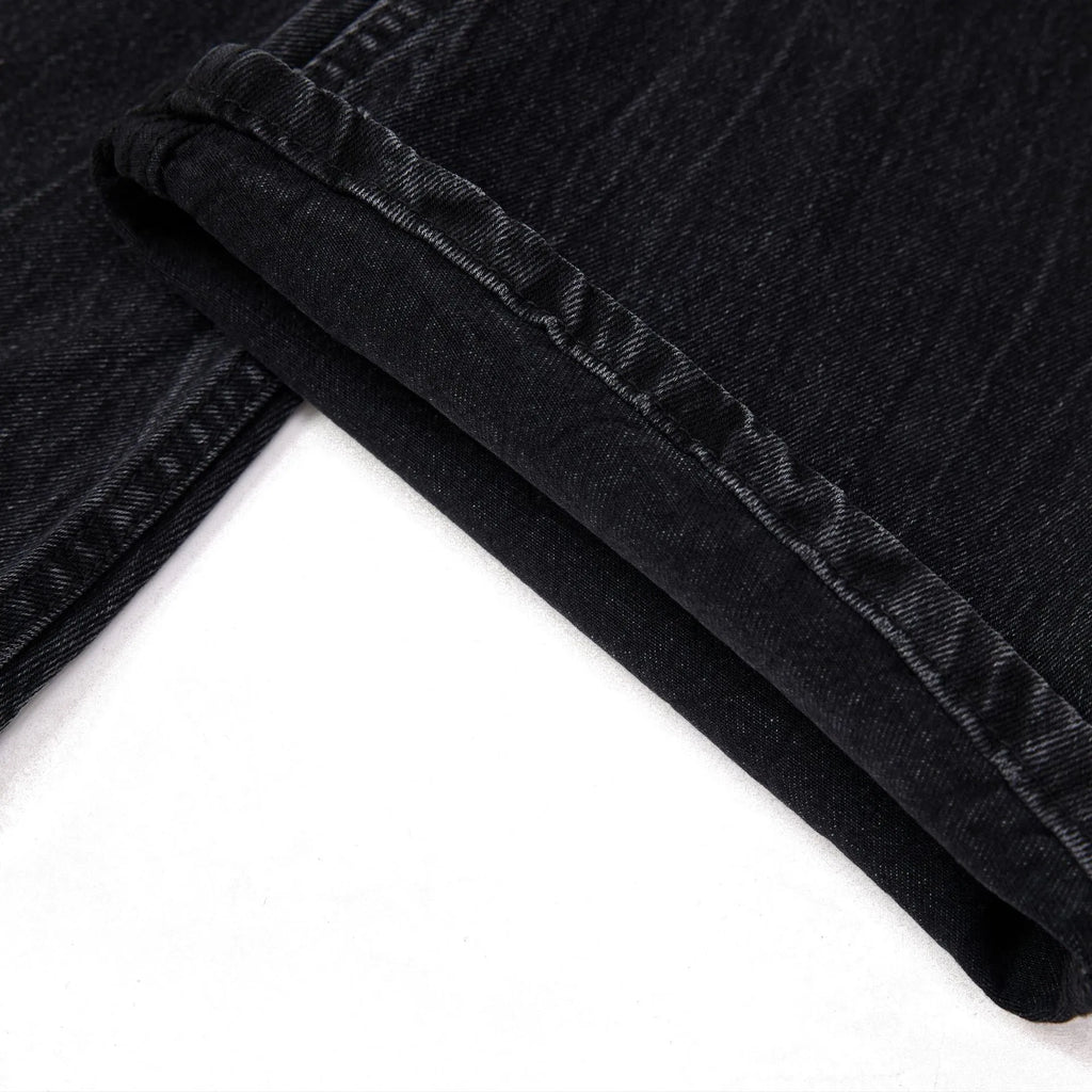 Black men's straight-leg jeans with American washed lightning crack texture