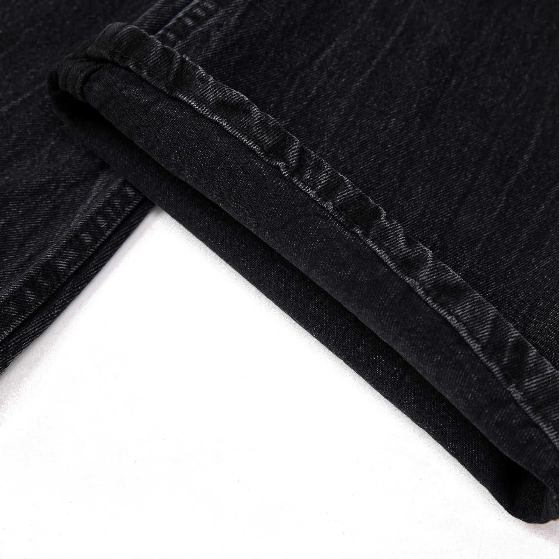 Black men's straight-leg jeans with American washed lightning crack texture
