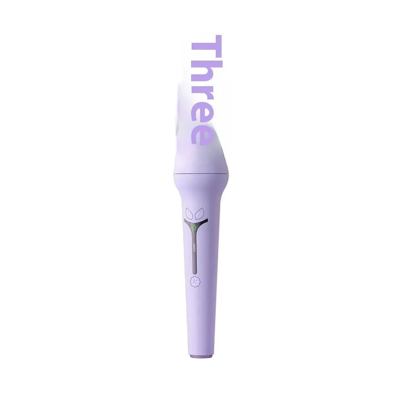 32mm automatic hair curler in pink or light purple with ceramic barrel, clips, and comb.