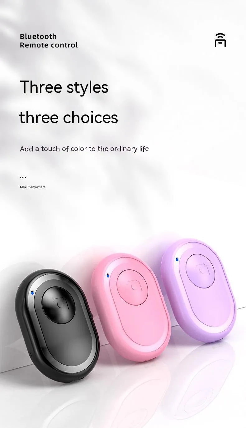 Compact black wireless Bluetooth remote control for smartphone camera photography
