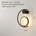 Modern minimalist light luxury wall lamp in black finish with iron and acrylic construction, 22.5cm diameter, 30cm height
