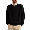 A grey men's loose-fit half-zip sweater with a textured knit and long sleeves.