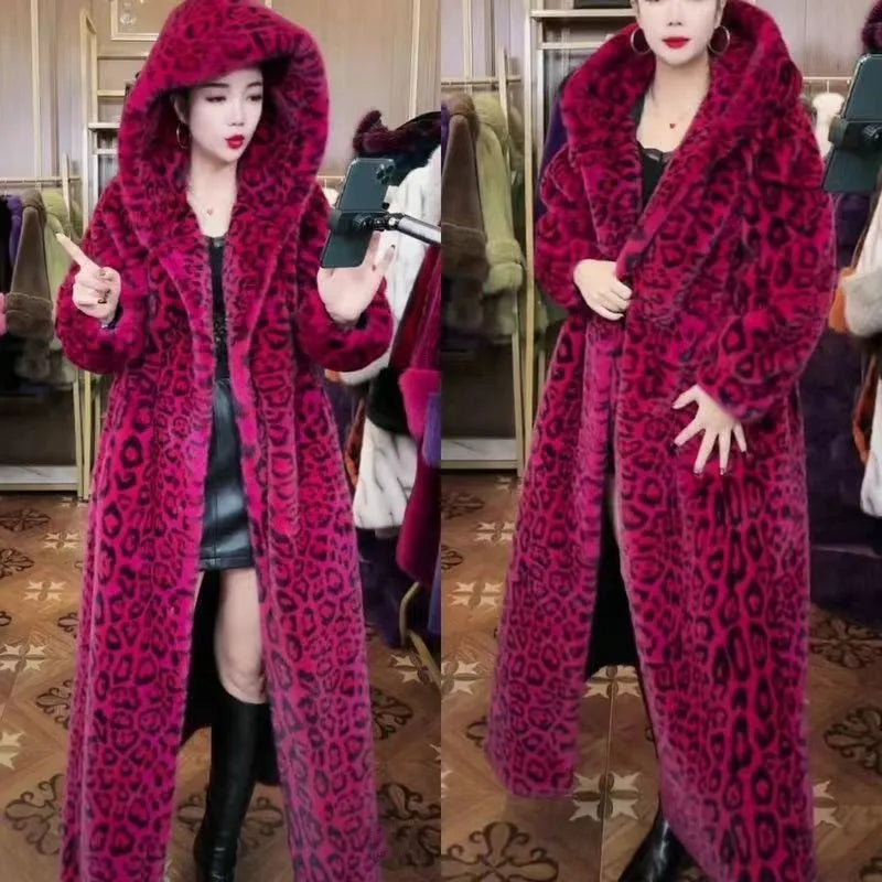 Long brown leopard print faux fur coat on a hanger, showing its loose plus-size fit and full length.