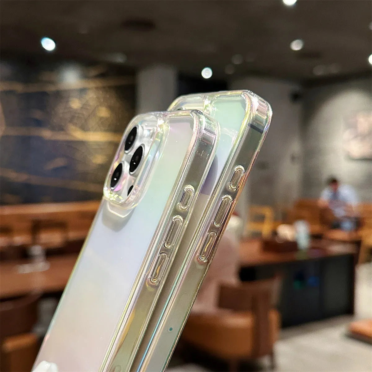 Colourful PC TPU phone case with mirror finish for iPhone 15 series, pink and purple options shown