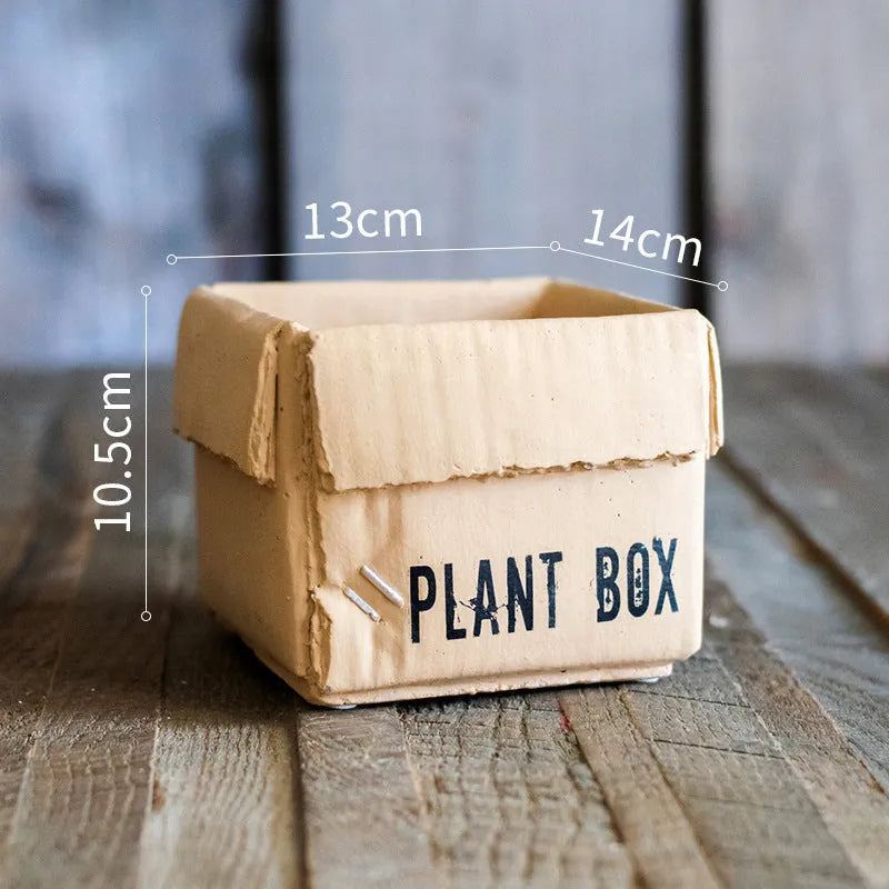 Cement brown paper box flowerpot with drainage holes for indoor planting