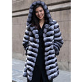 Women's zebra stripe faux fur overcoat with a 65cm medium length on a hanger
