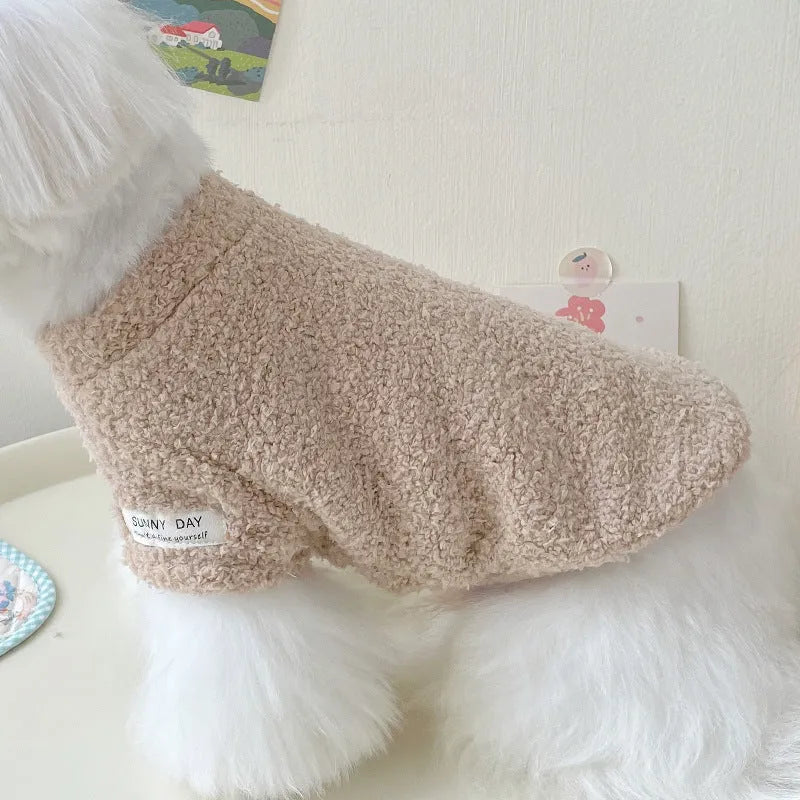 A dog wearing a double-sided cloud velvet thickened jacket in one of six available colours.