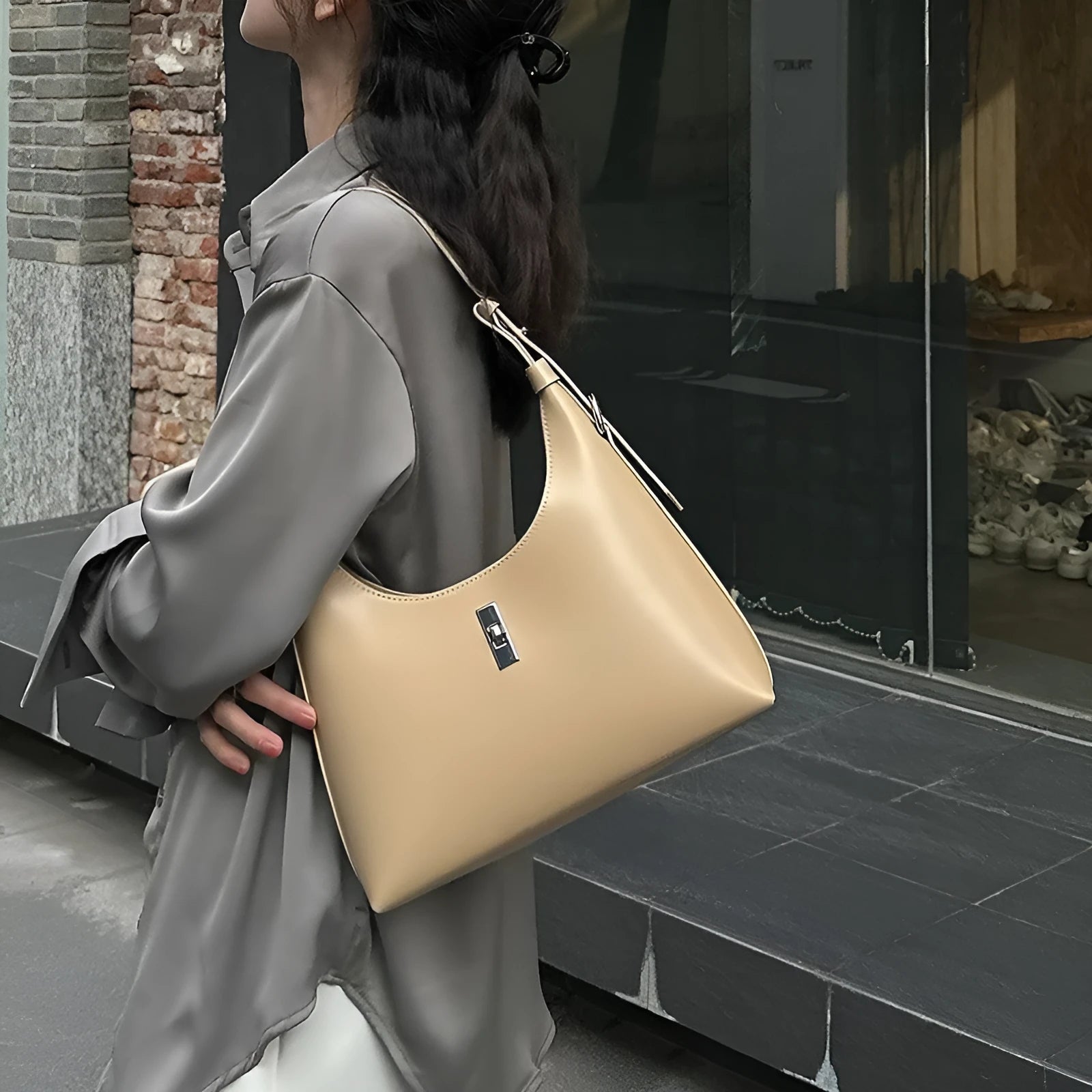 Genuine cowhide leather crossbody shoulder bag in dumpling shape with organised internal compartments