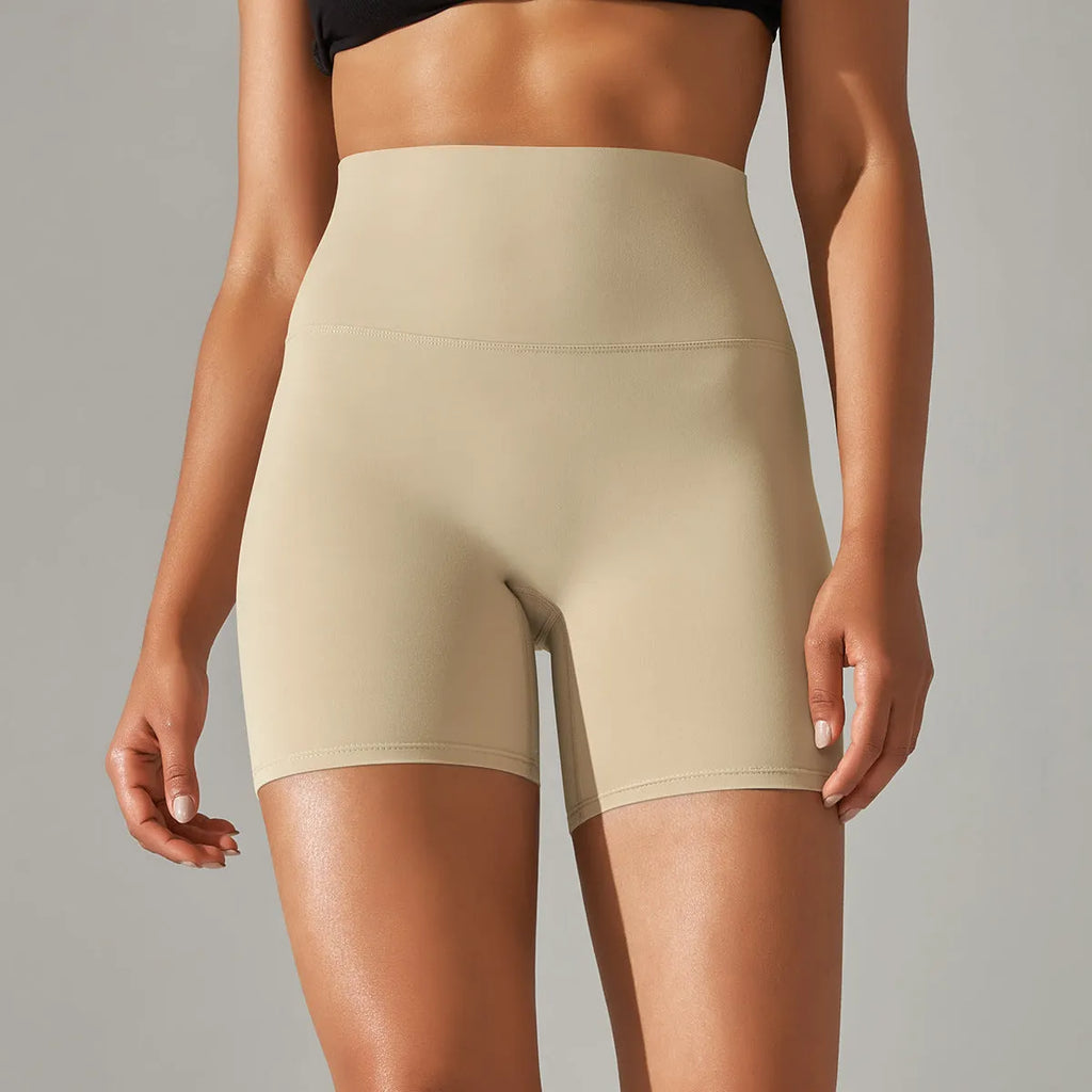 Dark green high waist women's fitness tights made from nylon spandex fabric.
