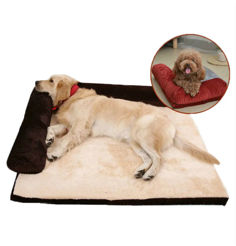 A corduroy pet sofa dog bed with bolsters, shown in a grey colour, placed on a hardwood floor.