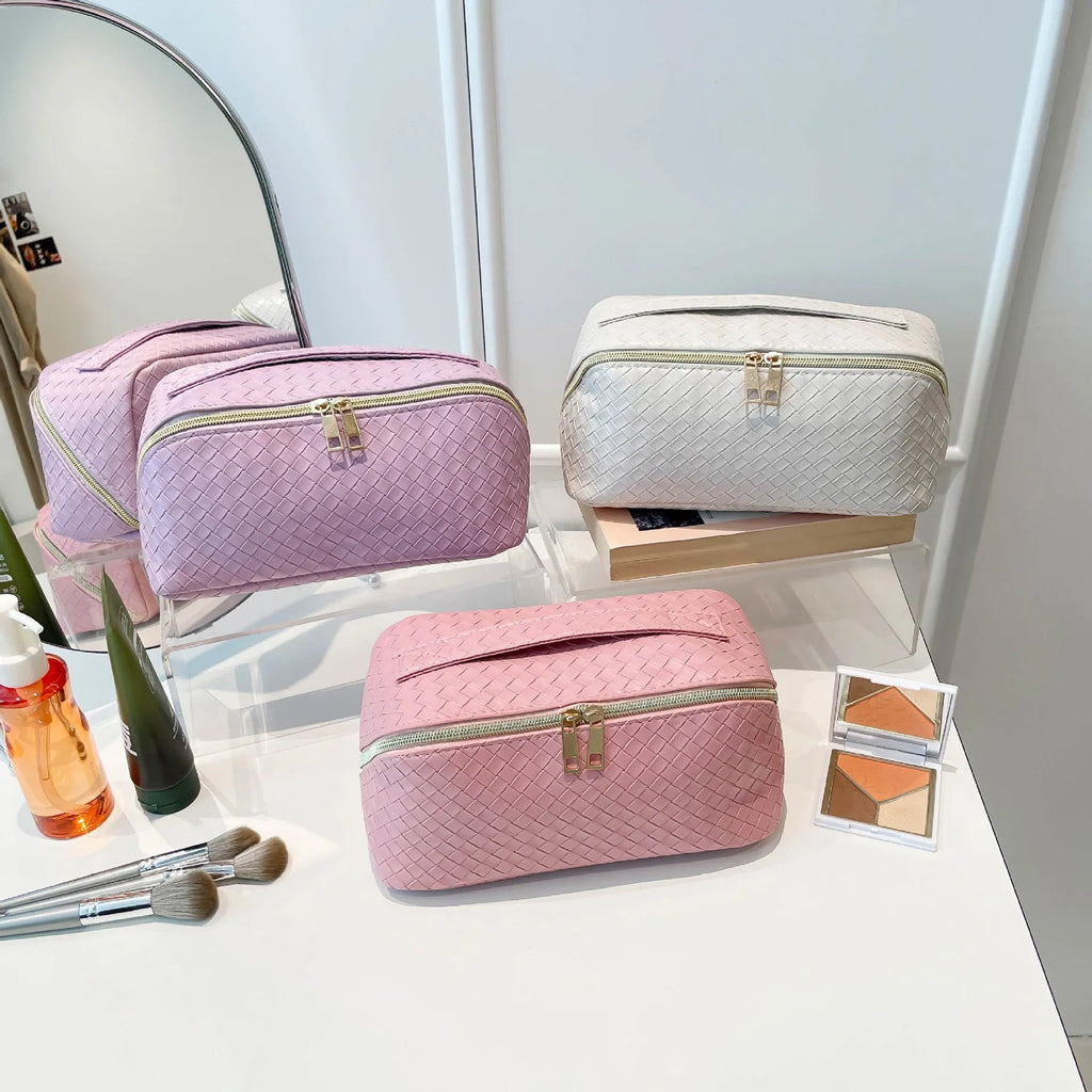 Waterproof large capacity multifunctional storage bag in pink, made from PU material, for cosmetics and daily use