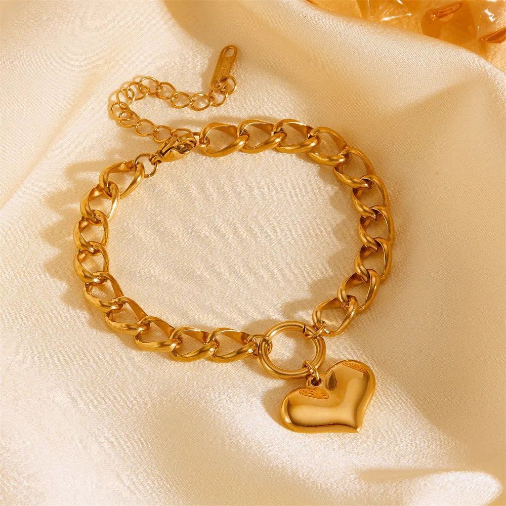 Titanium steel metal bracelet with round chain and heart detail in gold N510 colour