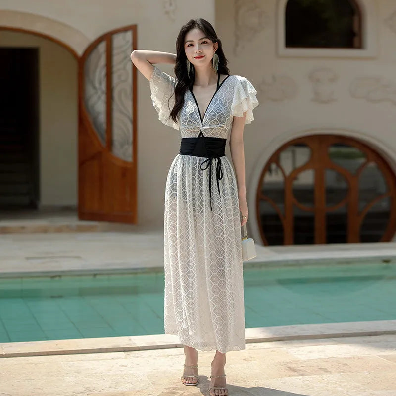 Xigeer fashion colourblock one-piece swimsuit for women in black with high-waist backless design