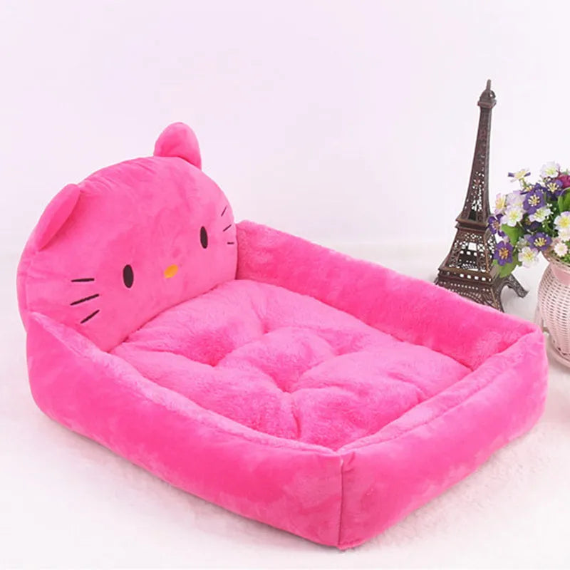 Cartoon-style plush pet bed sofa in blue, shown in small size for a dog or cat.