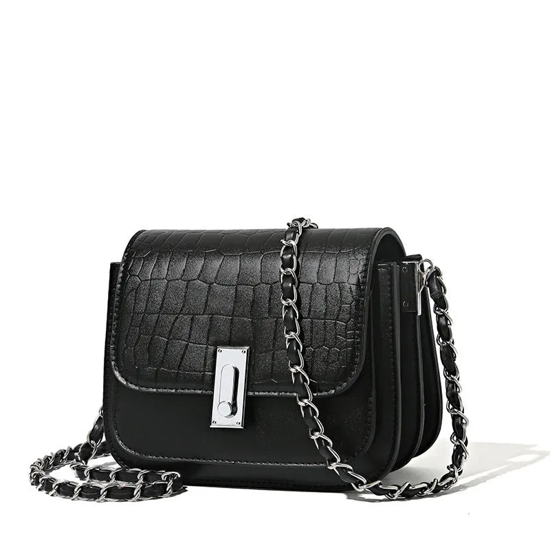 Women's soft PU chain crossbody shoulder bag in black, showing internal phone pocket and outer compartments.