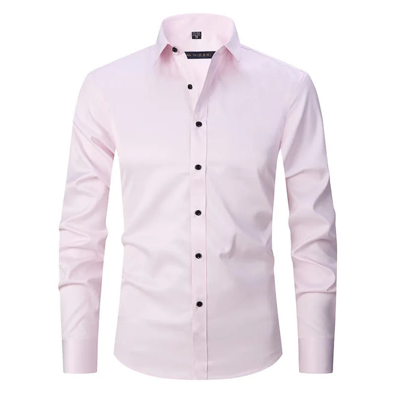 Man wearing a solid-colour stretch long sleeve work shirt made from polyester fabric.