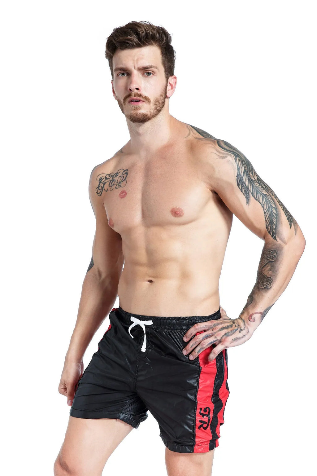 Blue men's sports shorts with lace-up front and slim fit on a white background.