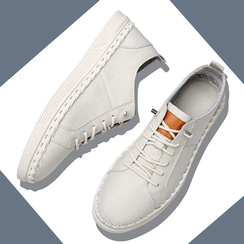 Men's beige and black cowhide leather sneakers with mesh lining and round toe.