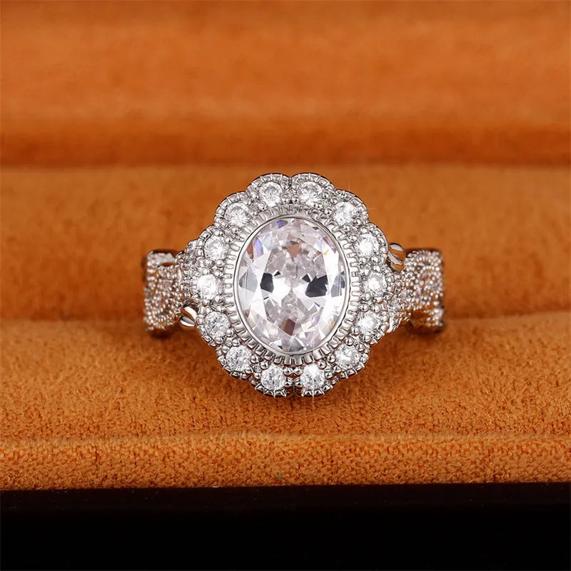 Geometric women's ring with round zircon elements in white gold colour on copper