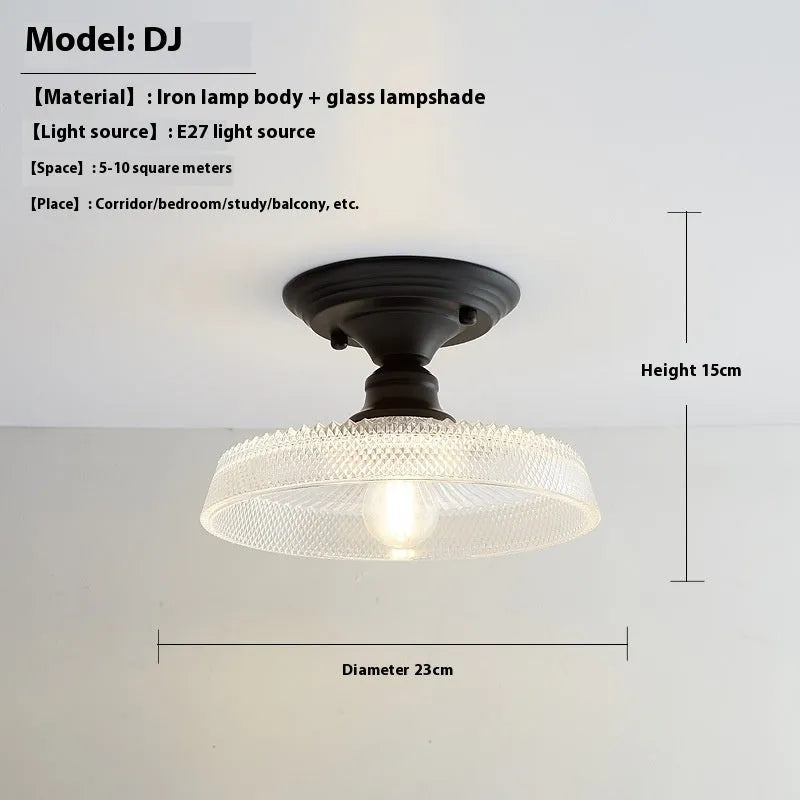 American retro single-head ceiling lamp with clear glass shade showing exposed filament style