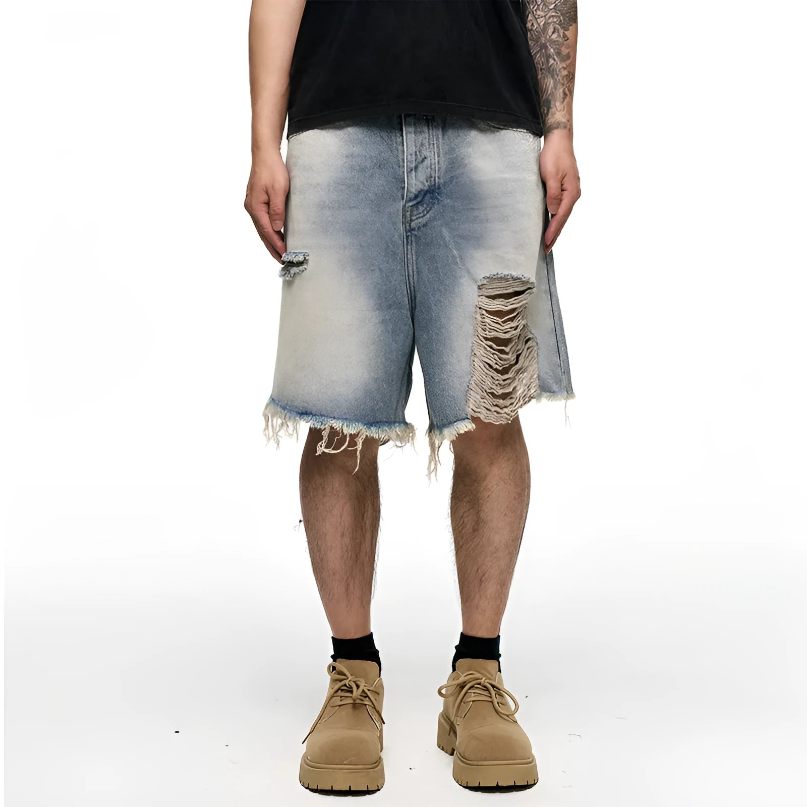 Men's light blue baggy denim shorts on a neutral background, showing wide leg and mid waist.