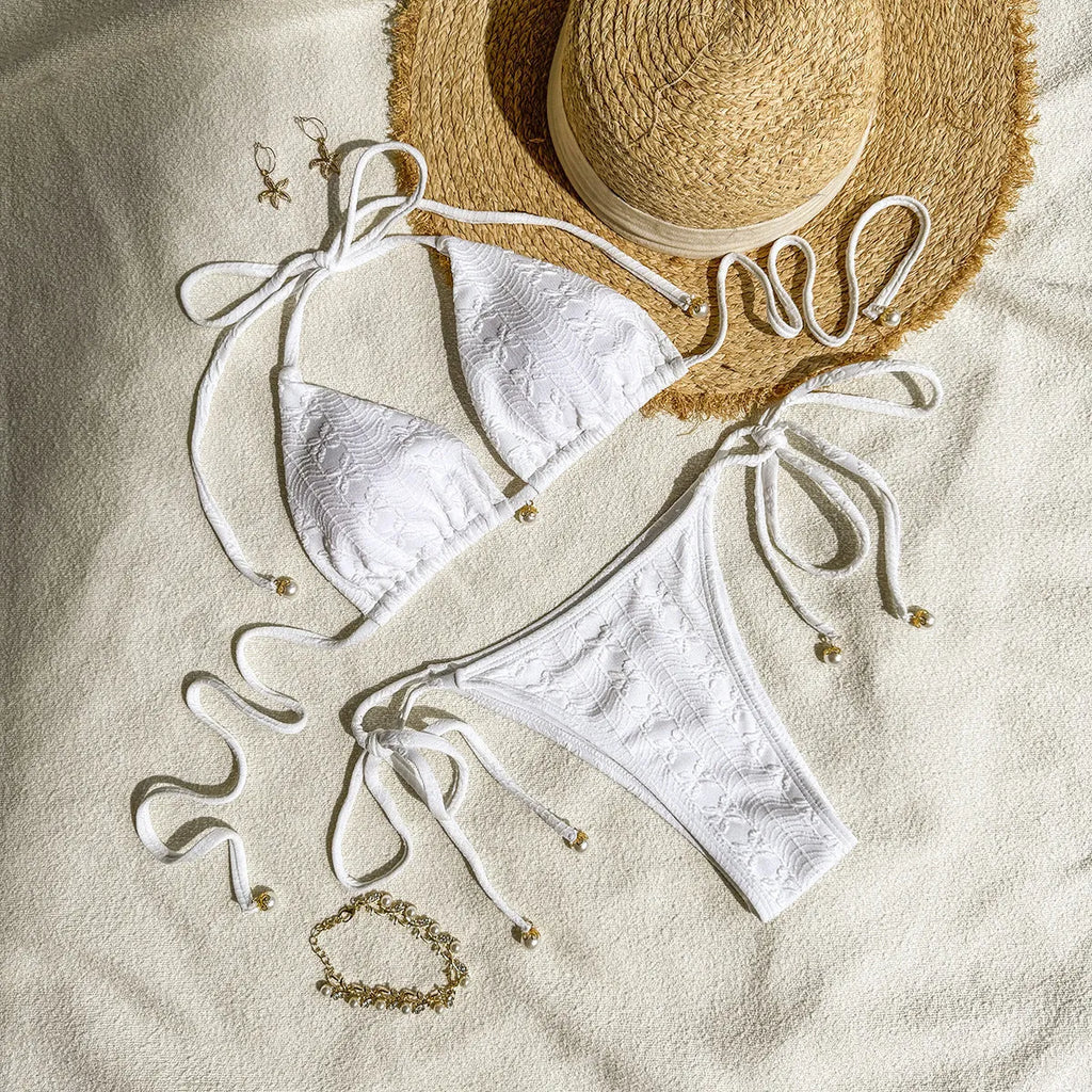Women's white halter lace-up bikini swimsuit with briefs bottom for beach use
