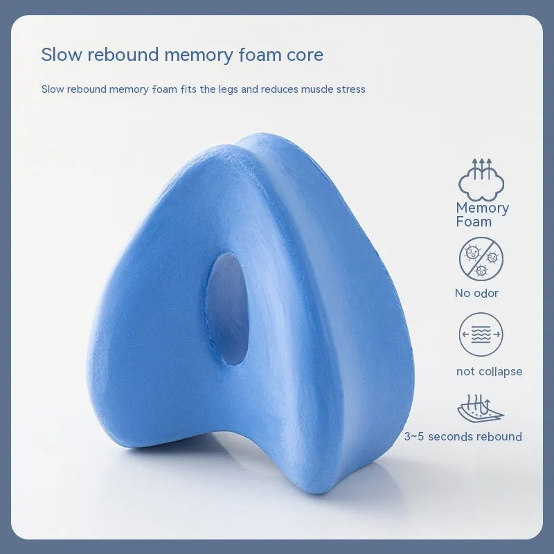 Heart-shaped dark blue memory foam leg pillow for adult use with 25x23x13cm dimensions