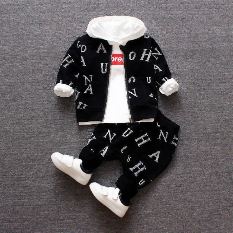 Red and white children's long sleeve two-piece clothing set made from polyester and vinylon fabric.