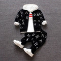 Red and white children's long sleeve two-piece clothing set made from polyester and vinylon fabric.