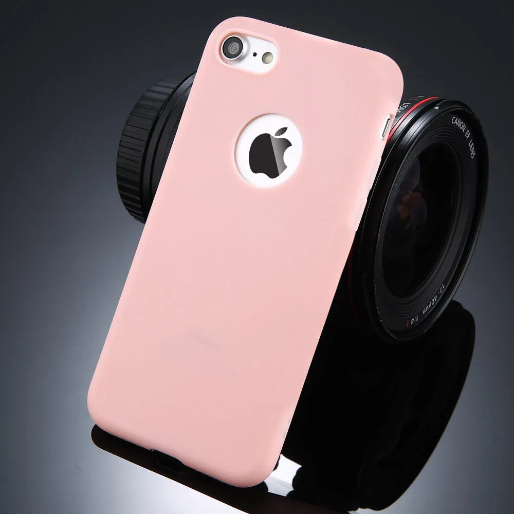 Soft silicon TPU phone case for iPhone in candy colours including pink, blue, and black on a white background.