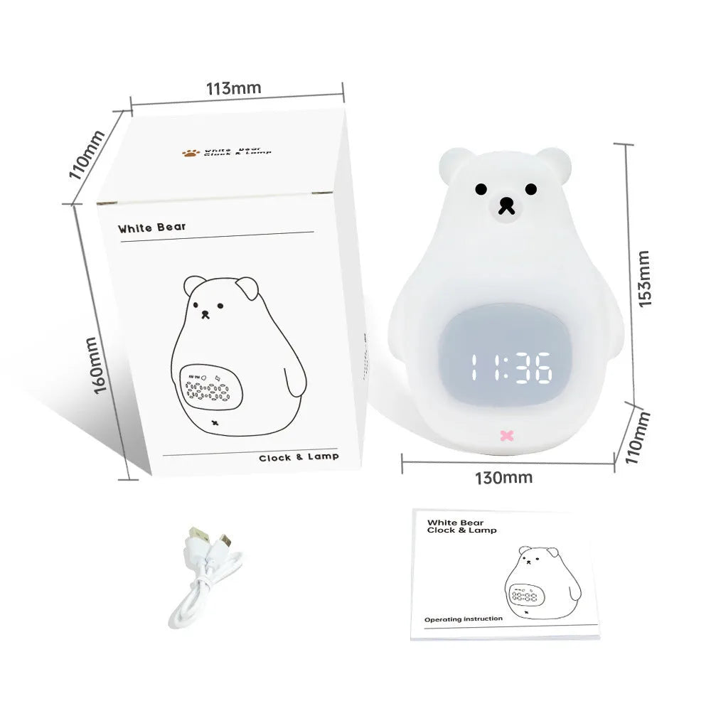 White silicone bear-shaped night light with button controls on a table.