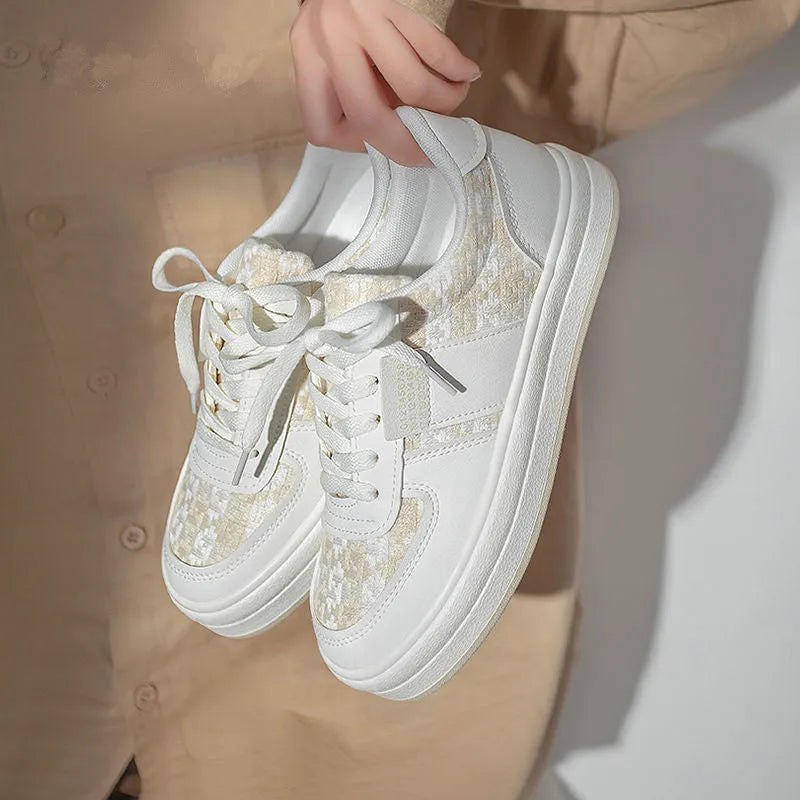 Beige plaid platform leisure sports shoes with white rubber sole and front lace-up fastening.