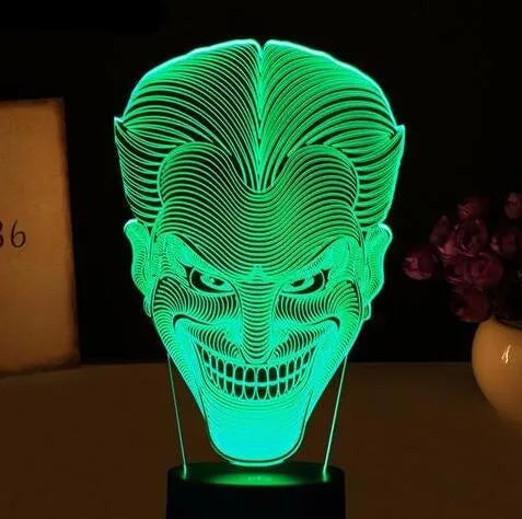 USB-powered 3D acrylic LED lamp with touch control and seven colour options on a desktop