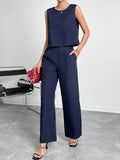 Women's red polyester two-piece set with sleeveless round neck top and wide leg trousers