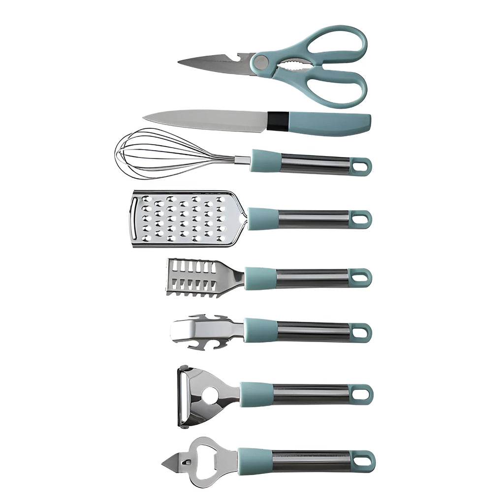 Stainless steel kitchen gadget set with peeler and whisk on grey tray