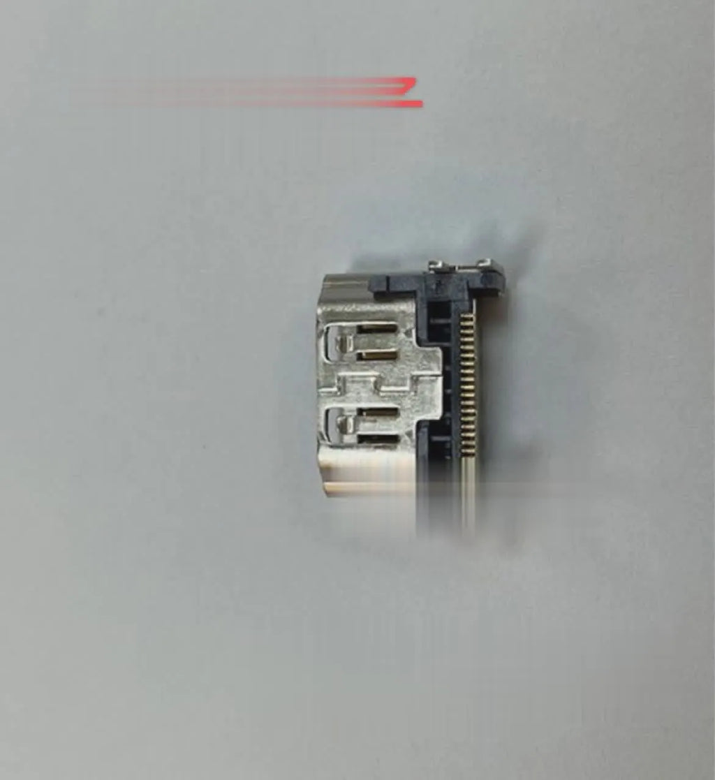 Silver HDMI host interface socket for game console repair and signal connectivity.