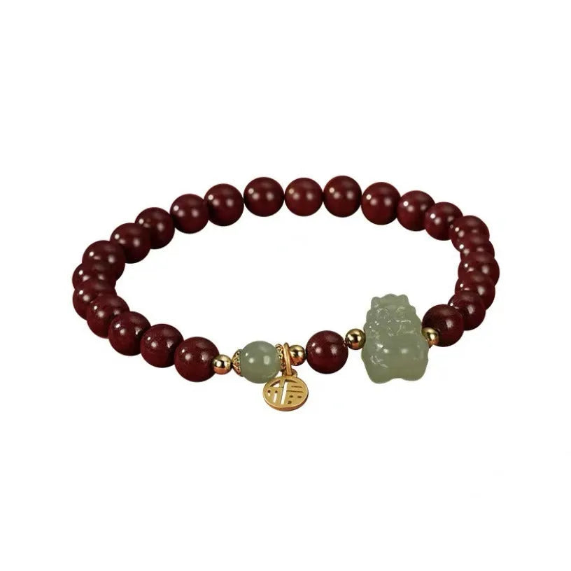 Natural Hetian jade cinnabar bracelet with 8mm beads and zodiac carvings