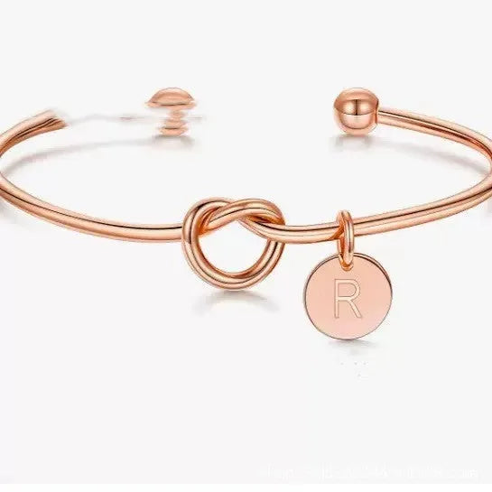 Titanium steel DIY love heart bracelet with electroplated finish showing letter wafer option