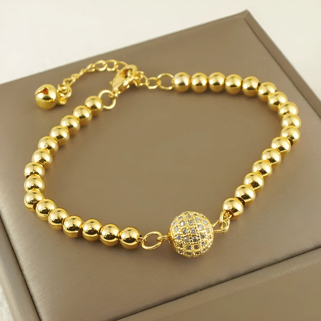 Copper heart-shaped bracelet with a single zircon stone in an Arabic style.