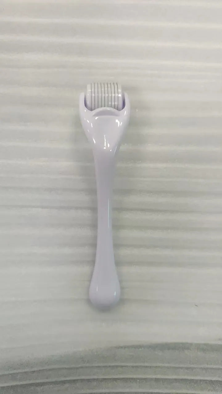 540 micro needle mechanical derma roller with black handle and coloured wheel options