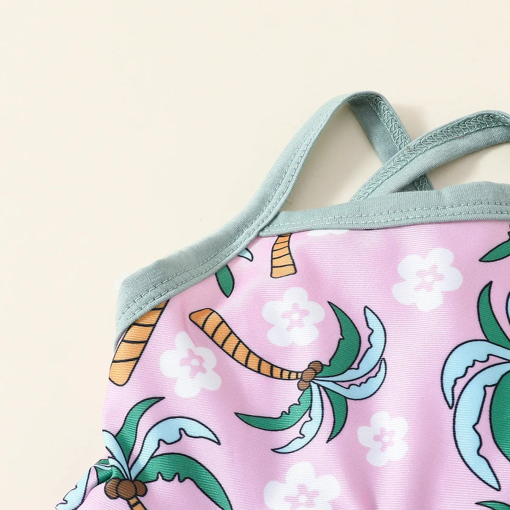 White children's two-piece swimsuit set with shirt and shorts for toddlers.