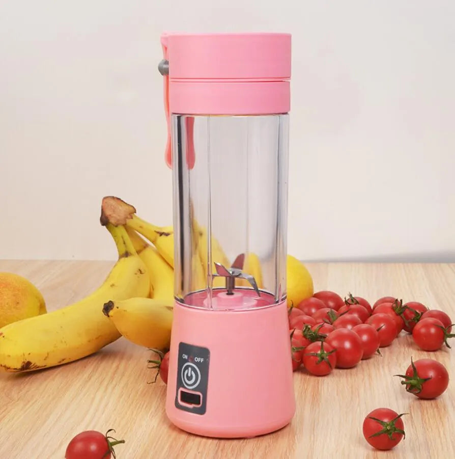 Portable pink USB electric fruit juicer with stainless steel blade and carrying rope