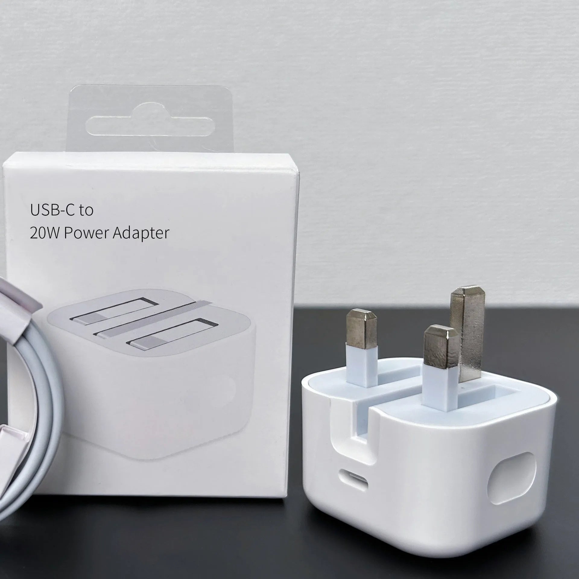 White 20W USB Type-C PD wall charger with set of five international travel plug adaptors